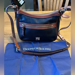 Like new! Black Dooney & Bourke cross body bag.